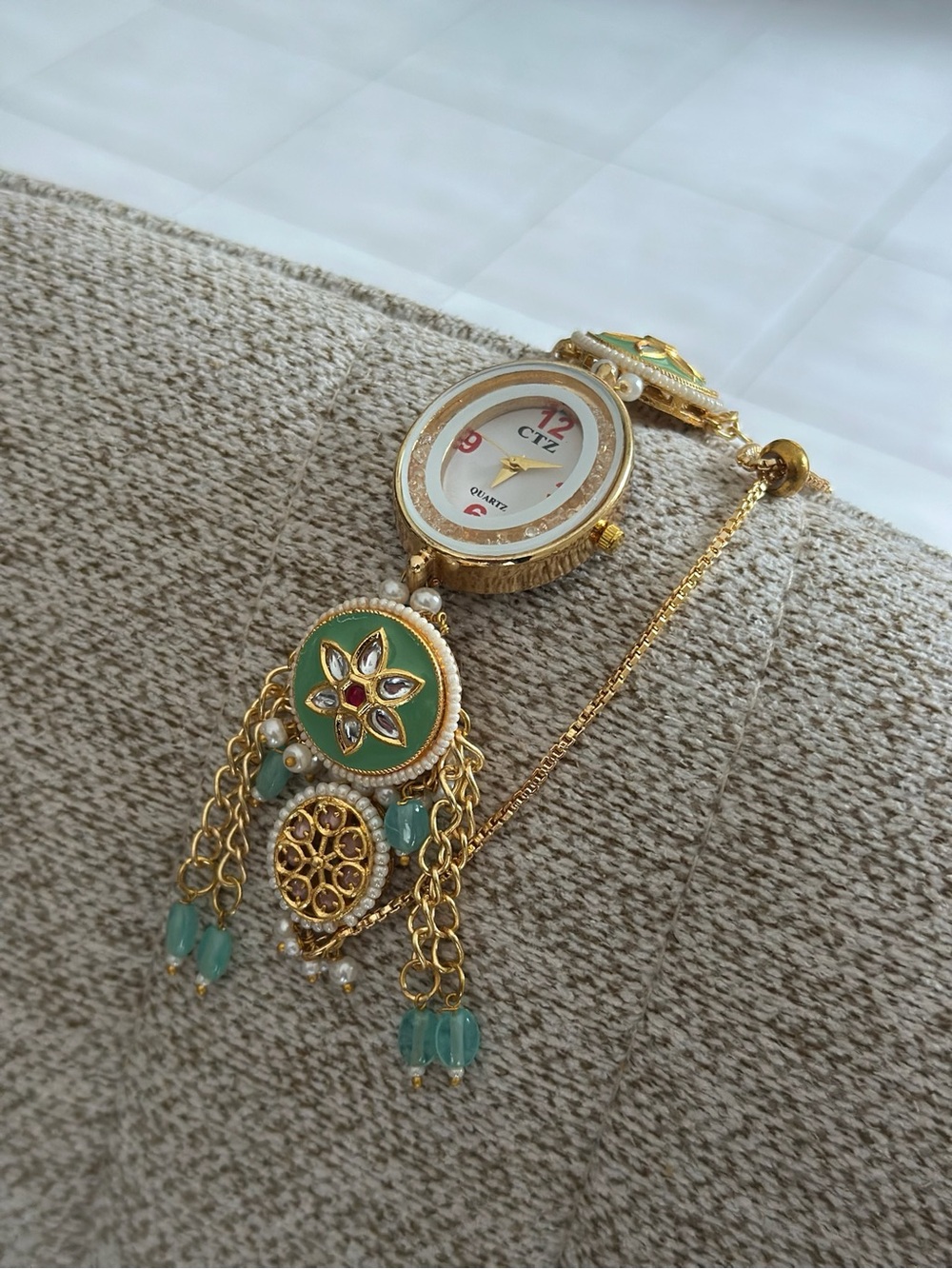 Gold-Plated Women's Bracelet Watch with Mint Green Enamel Accents